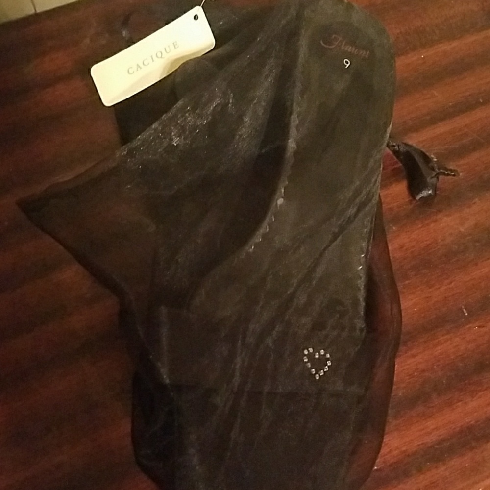 Black slid on slipper shoes